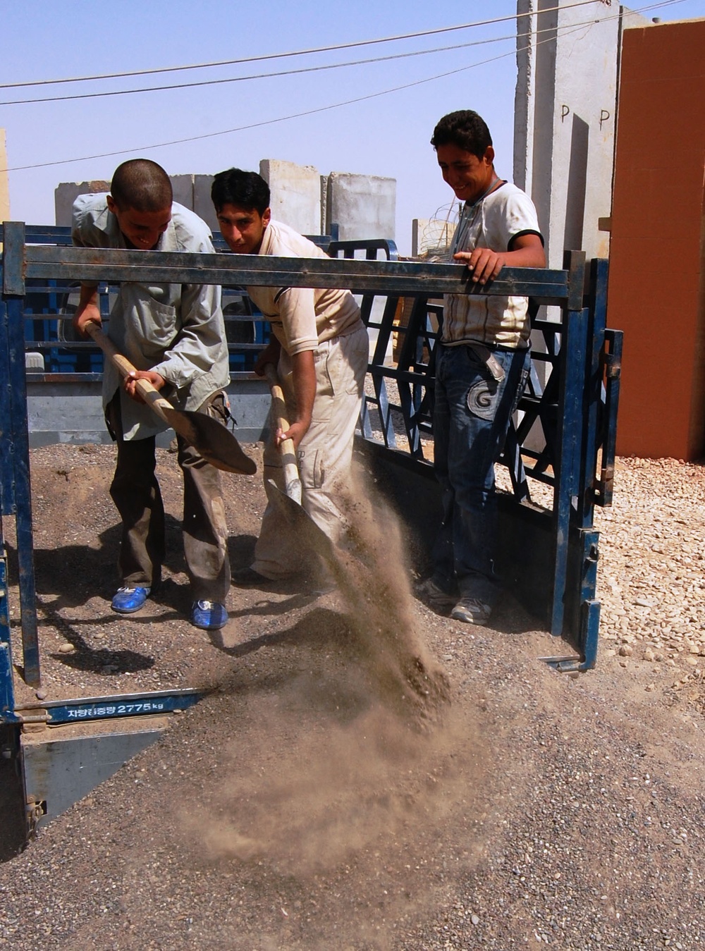 Iraqi Cousins Contribute to Reconstruction Efforts at U.S. Military Base