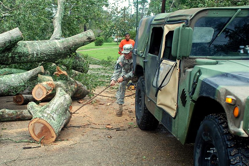 National Guard Soldier Clears Road Blocked by Hurricane Ike
