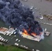 Air National Guard Crew Rescues Civilians and Pets from Yacht Warehouse Fire in Galveston