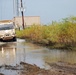 Louisiana National Guard Soldier Navigates Flooded Road to Protect Highway