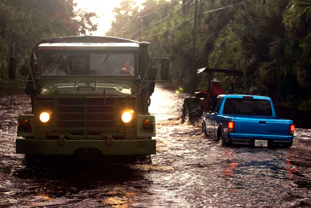 Army Soldiers Assist Flood Victims in High-Water Vehicles