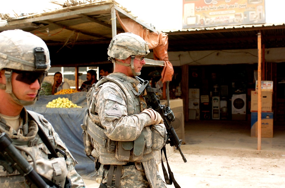 Army Sergeant Provides Security During Foot Patrol
