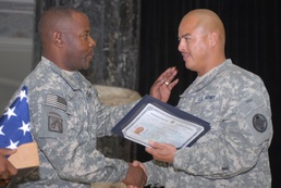 Army Command Sergeant Major Presents Flag to New U.S. Citizen in Iraq