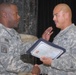 Army Command Sergeant Major Presents Flag to New U.S. Citizen in Iraq