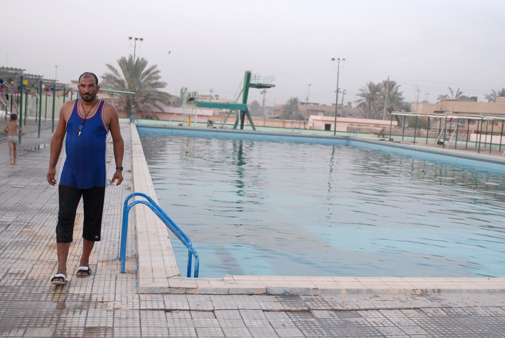 Lifeguard Watches Over Reopened Pool in Baghdad Neighborhood