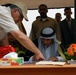 Iraqi Farmer Leader Signs Document for Time Capsule at New Agricultural Center