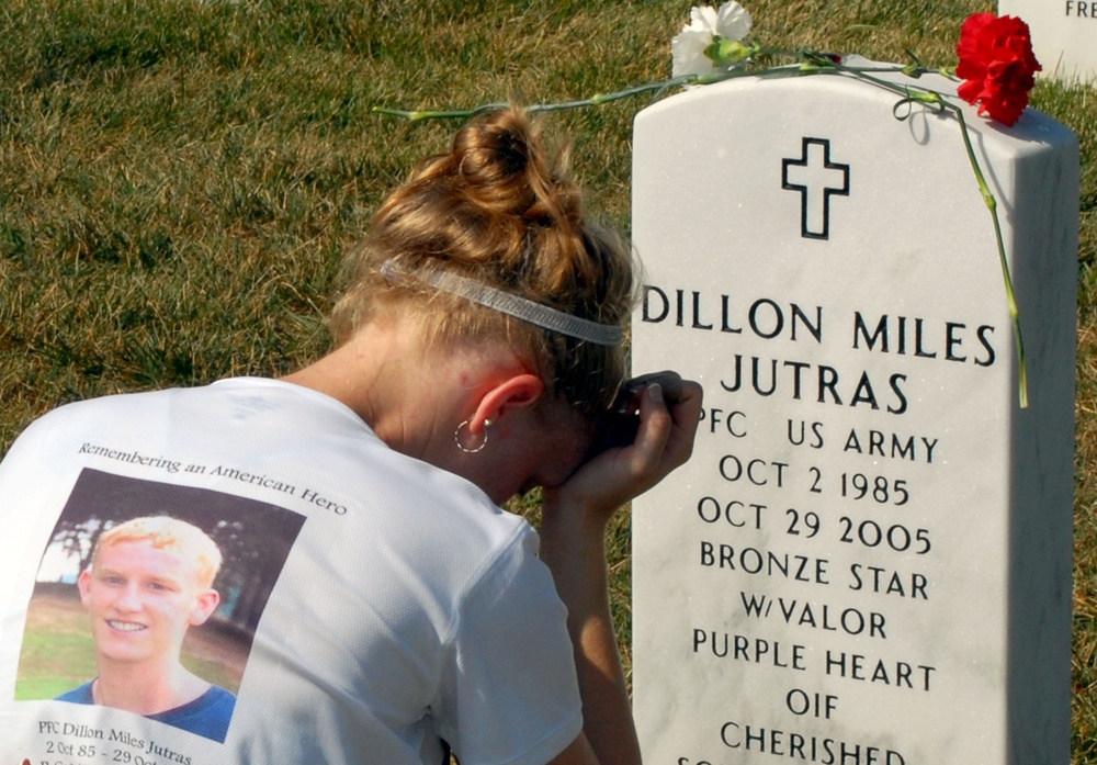 Grieving Family Honors Fallen Soldier at Arlington National Cemetery