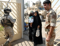 Iraqi, U.S. Troops Provide Medical Care in Sadr City