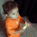 Iraqi Toddler Enjoys Banana During Medical Checkup