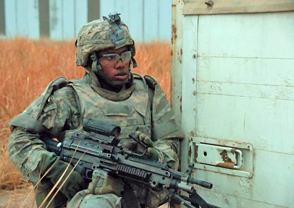 Soldier Provides Security During Baghdad Patrol