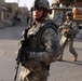 U.S. Soldiers Conduct Early-Morning Patrol in Baghdad Market