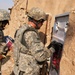 Army Sergeant Distributes Wanted Poster in Iraq