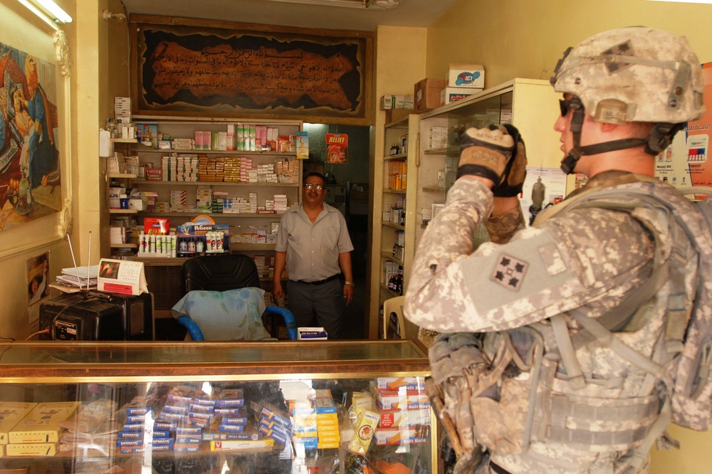 Soldiers Assist Iraqi Business Owners with Micro-Grant Applications