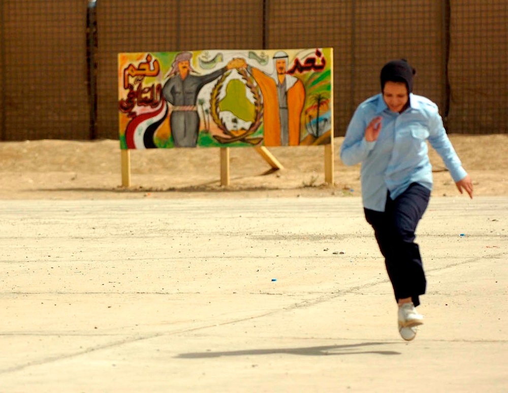 Iraqi Police Recruit Runs Lap After Training Misstep