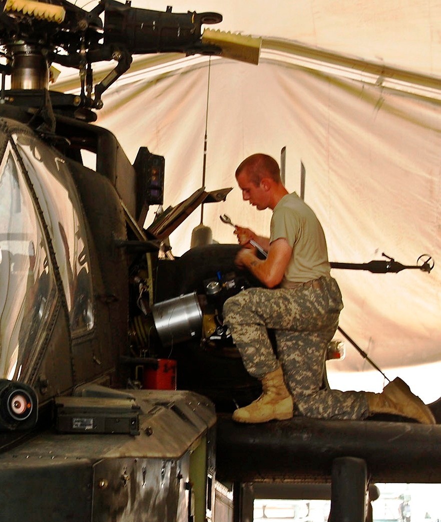 Young Soldier Maintains Apache Helicopters in Iraq