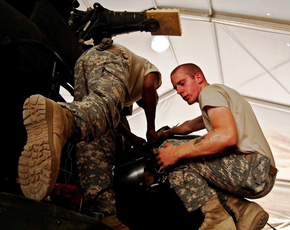 Young Soldier Maintains Apache Helicopters in Iraq