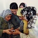 Soldier Shares Photo with Iraqi Household During Operation Summit Pursuit
