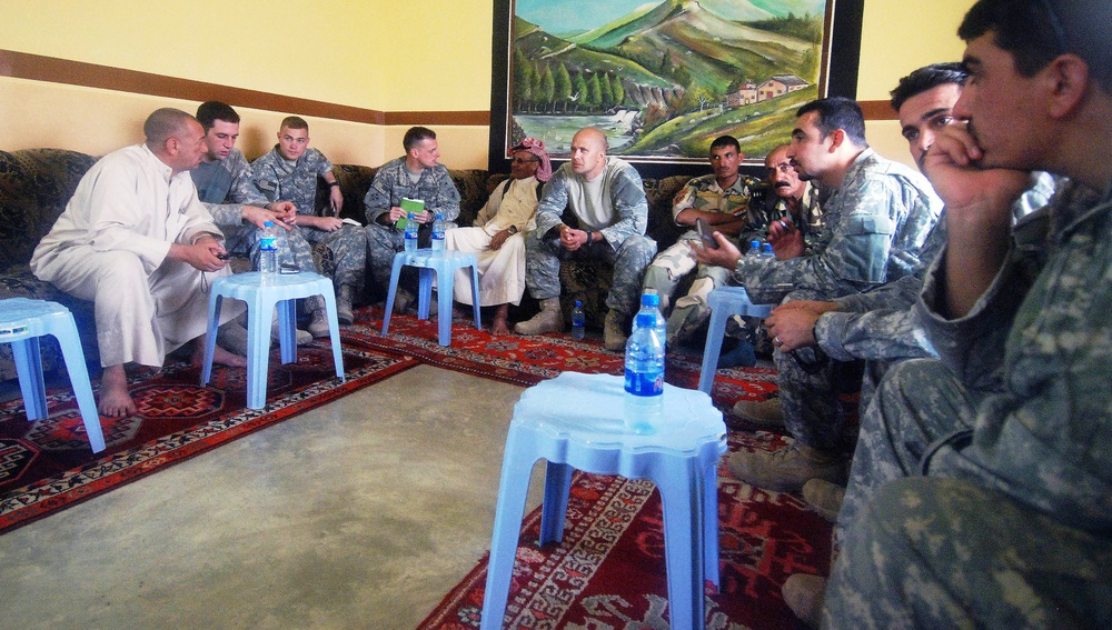 U.S. Soldiers Discuss Civil Affairs Projects with Iraqi Leaders in Hegnah