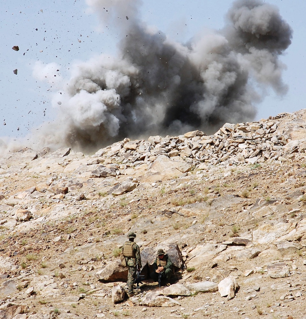 U.S. and Afghan Forces Detonate Explosives Near Enemy Position in Afghanistan