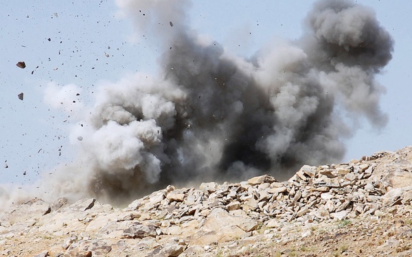 U.S. and Afghan Forces Detonate Explosives Near Enemy Position in Afghanistan