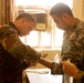 Salvadoran Officer Provides Medical Care to Iraqi Policeman in Kut