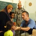 U.S. Soldier Assists Iraqi Girl During Medical Operation in Baghdad