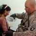 U.S. Soldier Provides Medical Care to Iraqi Woman in Baghdad