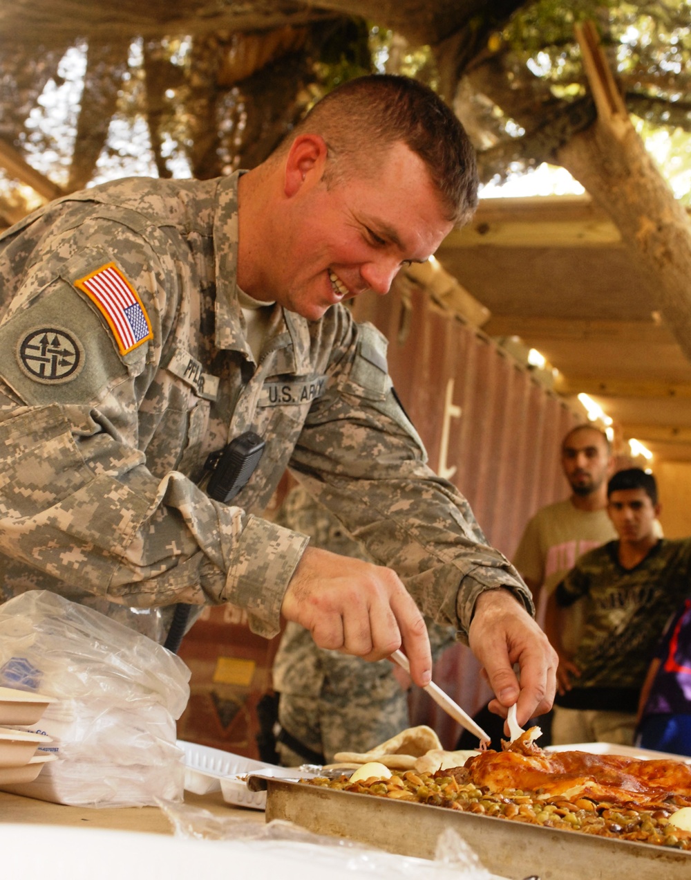 Army Staff Sgt. Celebrates Iraqi Workers with Traditional Meal