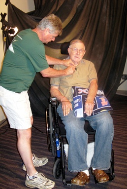 VA Audiovisual Specialist Prepares Veteran for Interview