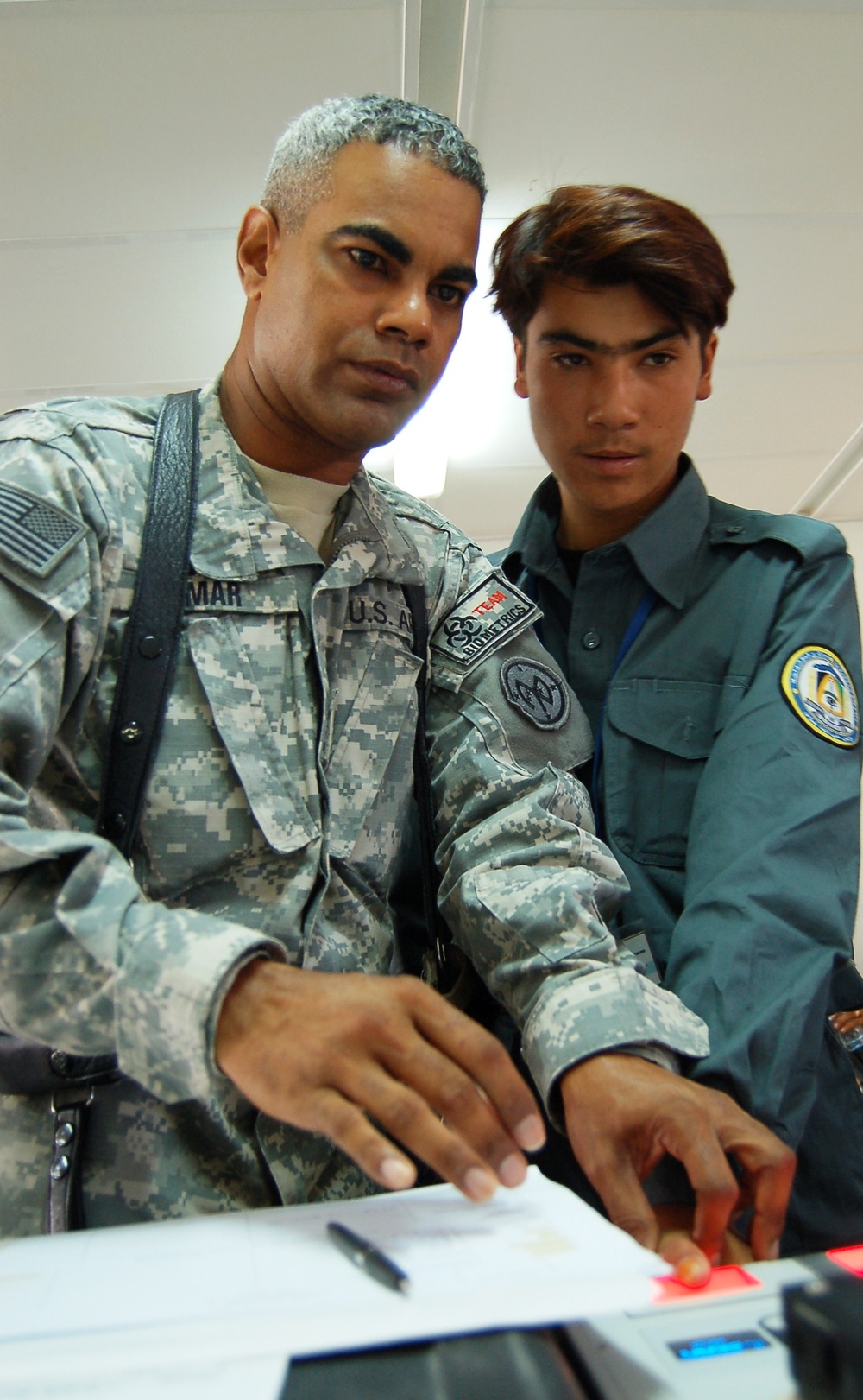 Afghan Police Undergo Biometric Screening for Training Program