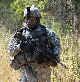 Army Staff Sgt. Investigates Blast Site in Baghdad