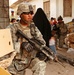 Soldier Provides Security During Market Patrol in Iraq
