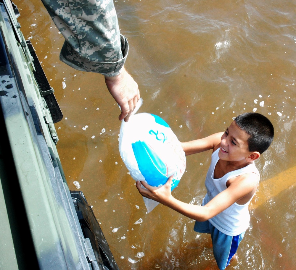 Texas National Guard Distributes Aid to Flood Victims During Hurricane Dolly Relief Effort