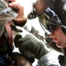 Army Medic Treats Injured Marine During Evacuation Mission in Afghanistan