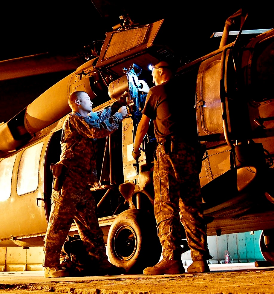 Army Crew Chiefs Prepare Black Hawk for Night Mission in Iraq