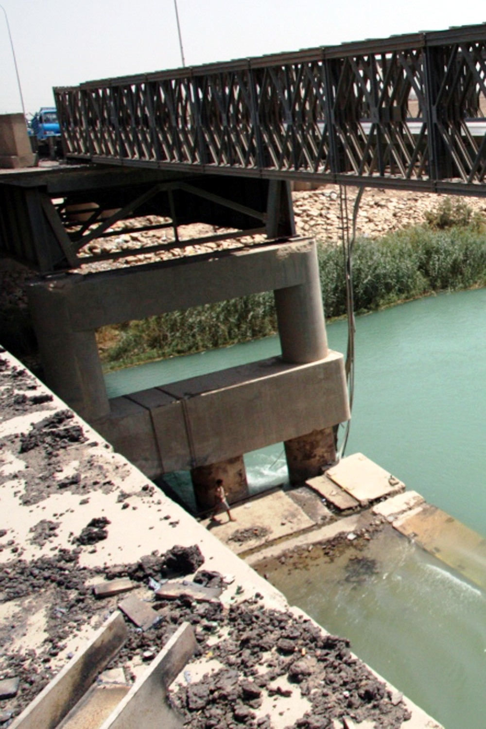 Repairs Underway on Damaged Grand Canal Bridge in Taji, Iraq