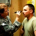 Army Doctor Evaluates Soldier for Concussion in Iraq