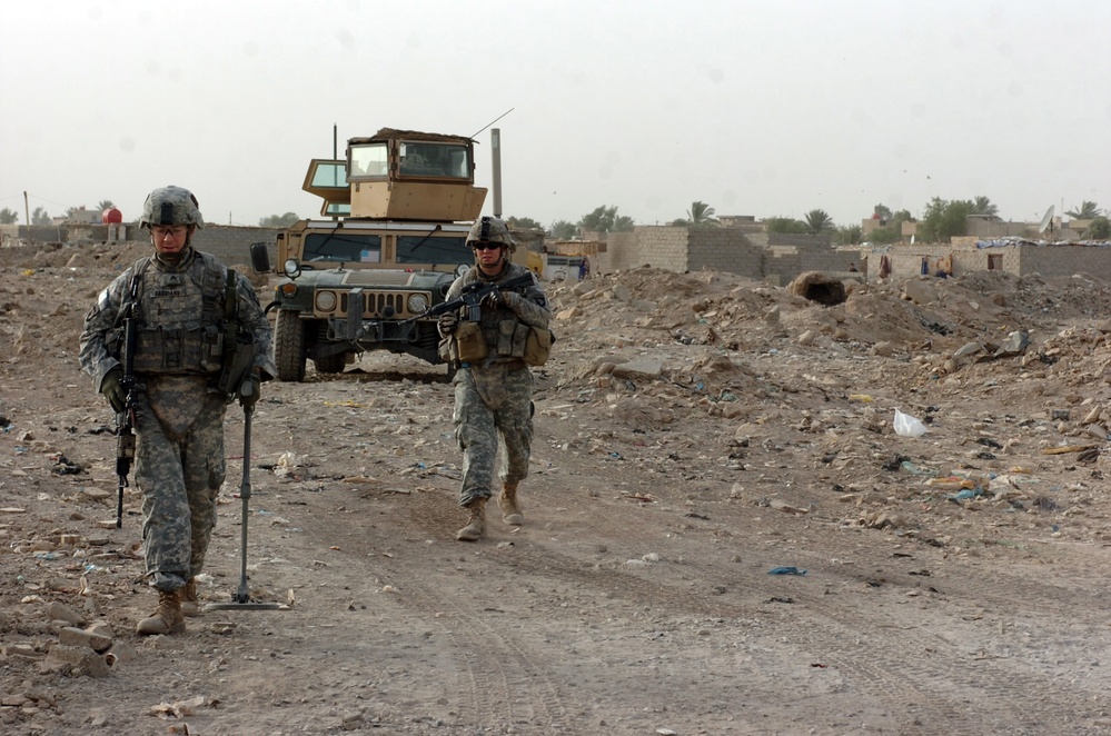 Sgt. Faggiano Searches for Enemy Caches in Iraq