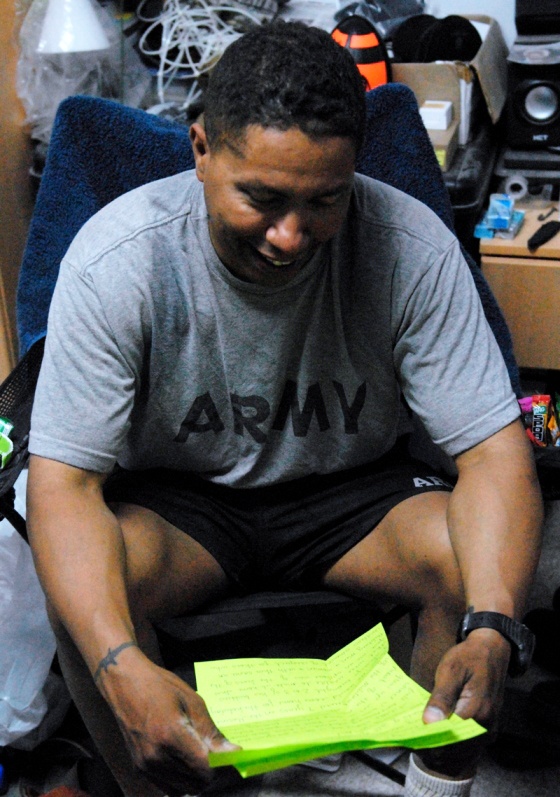 Soldier Receives Letter from Home While Deployed