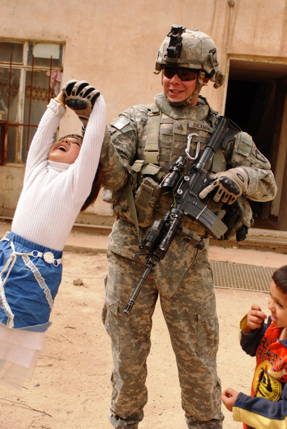 Soldier Connects with Iraqi Children During Mission