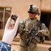 Soldier Connects with Iraqi Children During Mission