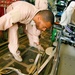 Air Force Airman Prepares C-130 for Aeromedical Evacuation Mission in Afghanistan