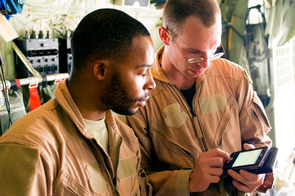 Air Force Airmen Use Digital Devices to Coordinate Aeromedical Evacuation Mission in Afghanistan