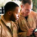 Air Force Airmen Use Digital Devices to Coordinate Aeromedical Evacuation Mission in Afghanistan