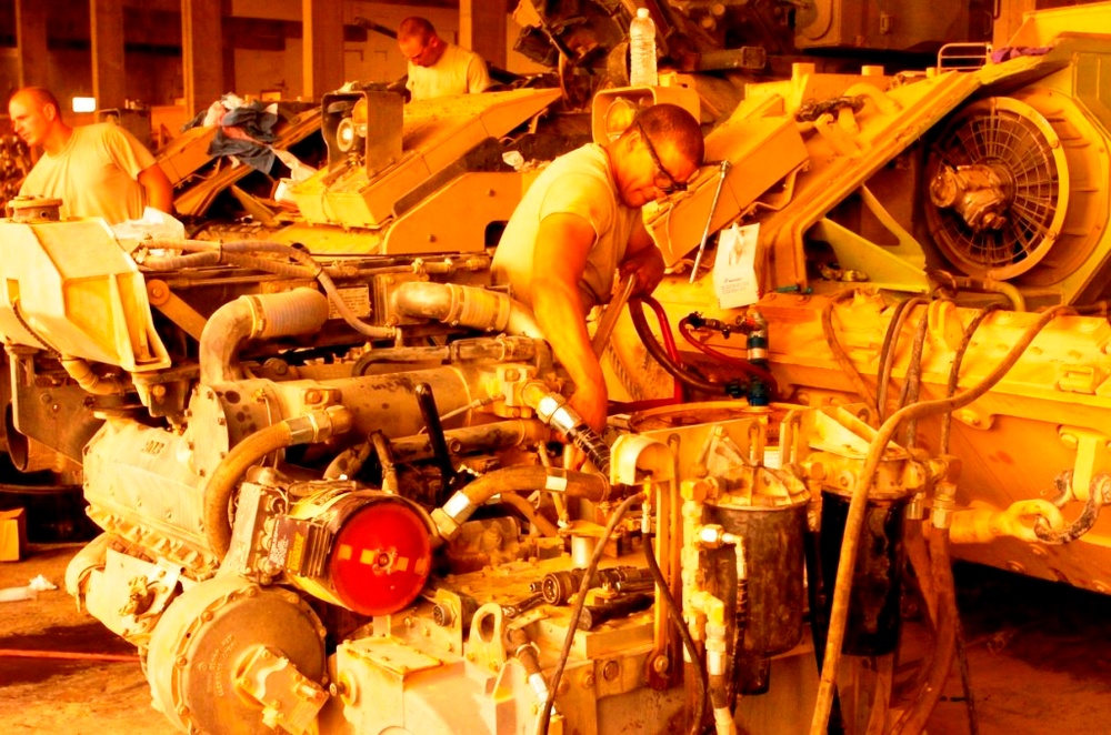 Army Mechanic Performs Routine Maintenance on Bradley Fighting Vehicle in Iraq