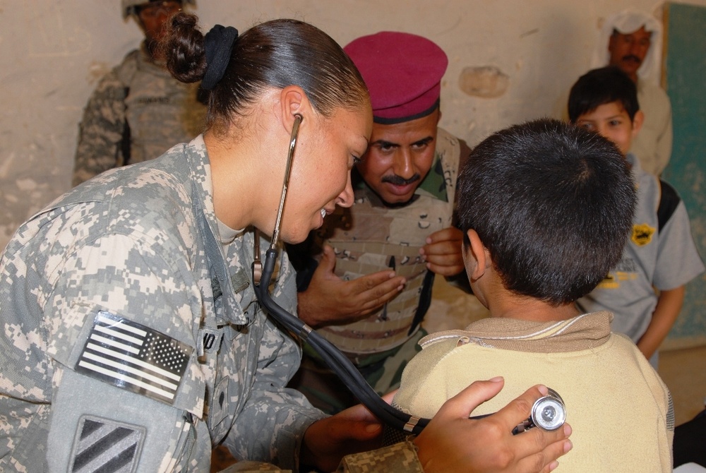 U.S. and Iraqi Medics Provide Care to Iraqi Child