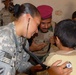 U.S. and Iraqi Medics Provide Care to Iraqi Child