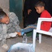 Army Medic Provides Care During Cooperative Medical Engagement