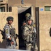 U.S. Soldier Assists Iraqi Police in Baghdad Clearance Mission