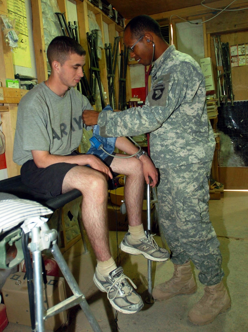 Combat Medic Tends to Soldier at Patrol Base Yusifiyah